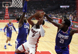 nba热火vs快船,热火与快船激战正酣，西部半决赛首轮对决精彩纷呈”